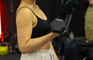 woman using exercise for breast growth